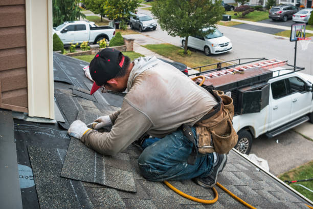 Professional Roofing technician working in Midland, WA